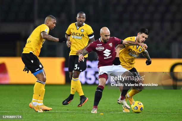 Simone Zaza of Torino F.C. And Kevin Bonifazi of Udinese Calcio battle for the ball during the Serie A match between Torino FC and Udinese Calcio at...