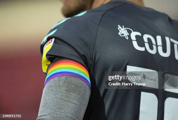 Detailed view of a Stonewall Rainbow Laces armband on the arm of Paul Coutts of Fleetwood Town during the Sky Bet League One match between Swindon...