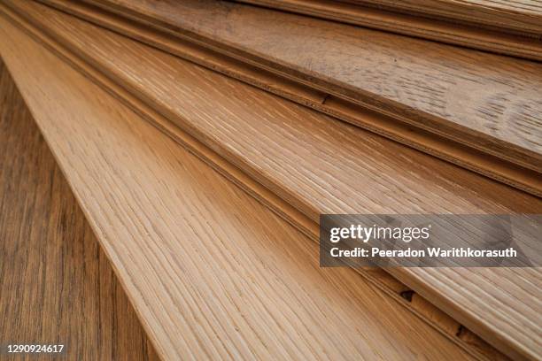 top view, selective focus of light engineered hardwood or laminate flooring samples. - engineered hardwood stockfoto's en -beelden