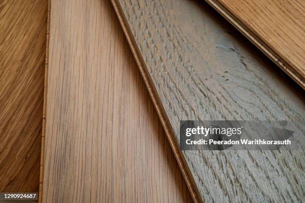 top view, selective focus of light engineered hardwood or laminate flooring samples. - engineered hardwood stockfoto's en -beelden