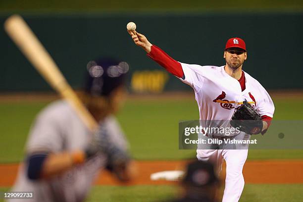 Chris Carpenter of the St. Louis Cardinals throws a pitch against the Milwaukee Brewers during Game Three of the National League Championship Series...