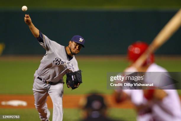 Yovani Gallardo of the Milwaukee Brewers throws a pitch against the St. Louis Cardinals during Game Three of the National League Championship Series...