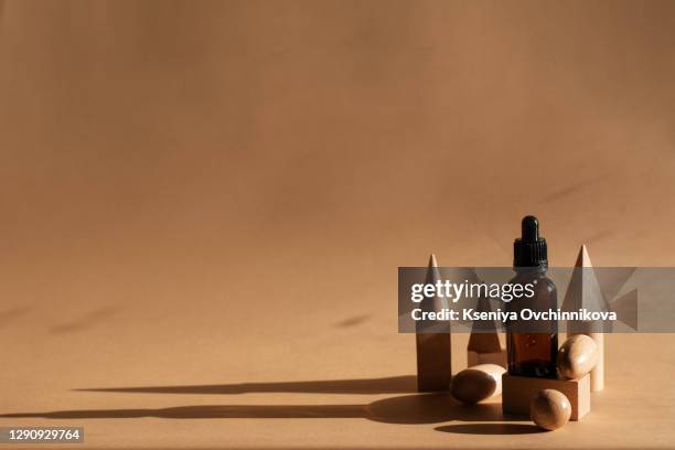 composition with bottles of essential oils on table. natural cosmetics - antiseptic cream stock pictures, royalty-free photos & images