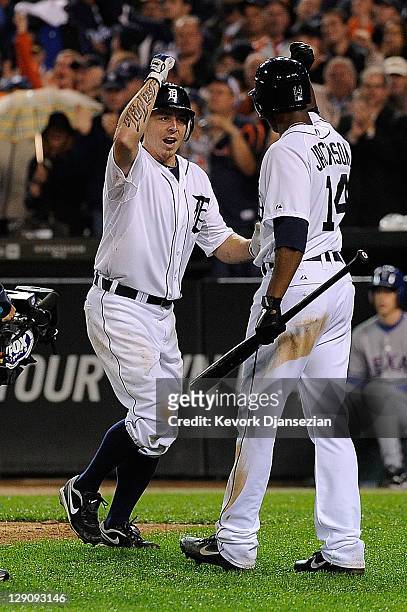 Brandon Inge of the Detroit Tigers celebrates after a solo home run with Austin Jackson of the Detroit Tigers in the seventh inning of Game Four of...