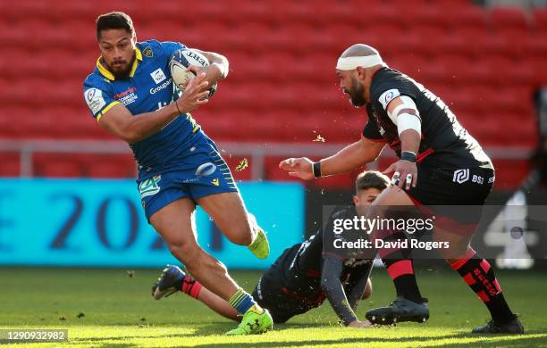 George Moala of Clermont Auvergne breaks away from John Afoa during the Heineken Champions Cup Pool 2 match between Bristol Bears and ASM Clermont...