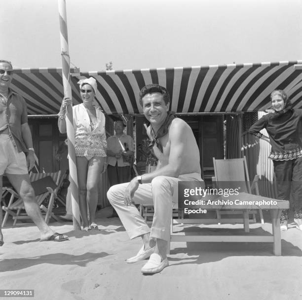 French singer Gilbert Becaud in Lido, Venice, 1962.
