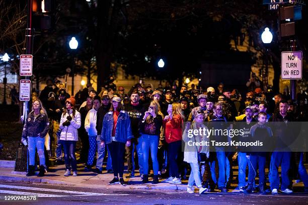 Supporters of President Donald Trump gather near Black Lives Matter Plaza during a protest on December 12, 2020 in Washington, DC. Thousands of...