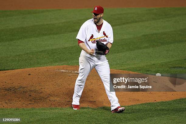 Chris Carpenter of the St. Louis Cardinals reacts after he struck out Rickie Weeks of the Milwaukee Brewers to end the top of the fifth inning during...