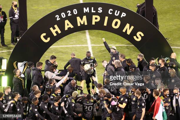 Captain Jonathan Mensah Columbus Crew celebrate with The Philip Anschutz trophy, MLS Cup on stage after the Major League Soccer Cup Final 2020...