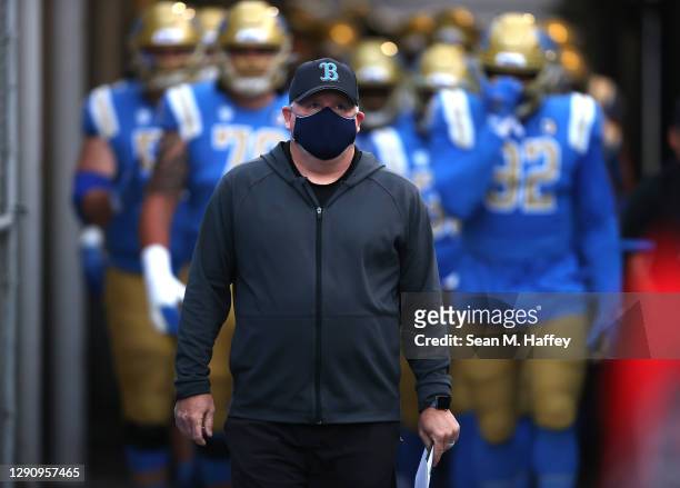 Head coach Chip Kelly of the UCLA Bruins enters the stadium prior to a game against the USC Trojans at the Rose Bowl on December 12, 2020 in...
