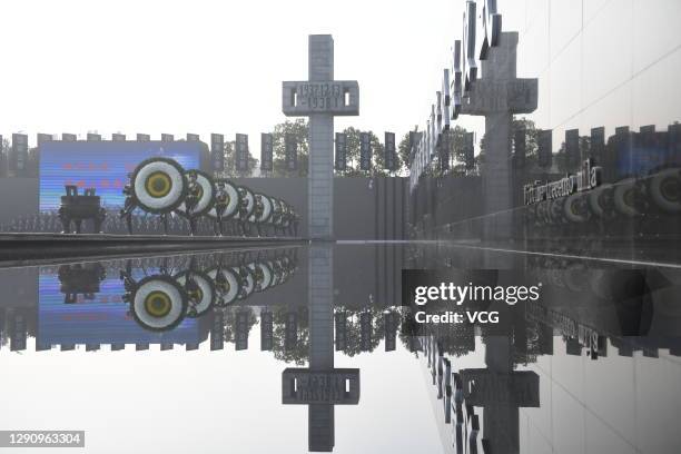 People attend the national memorial ceremony for the Nanjing Massacre victims at the Memorial Hall of the Victims of the Nanjing Massacre by Japanese...