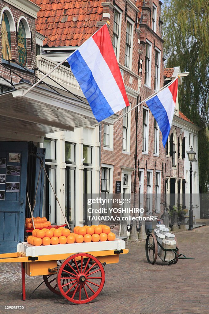 Cheese Cart and Dutch Flags Outside of Store