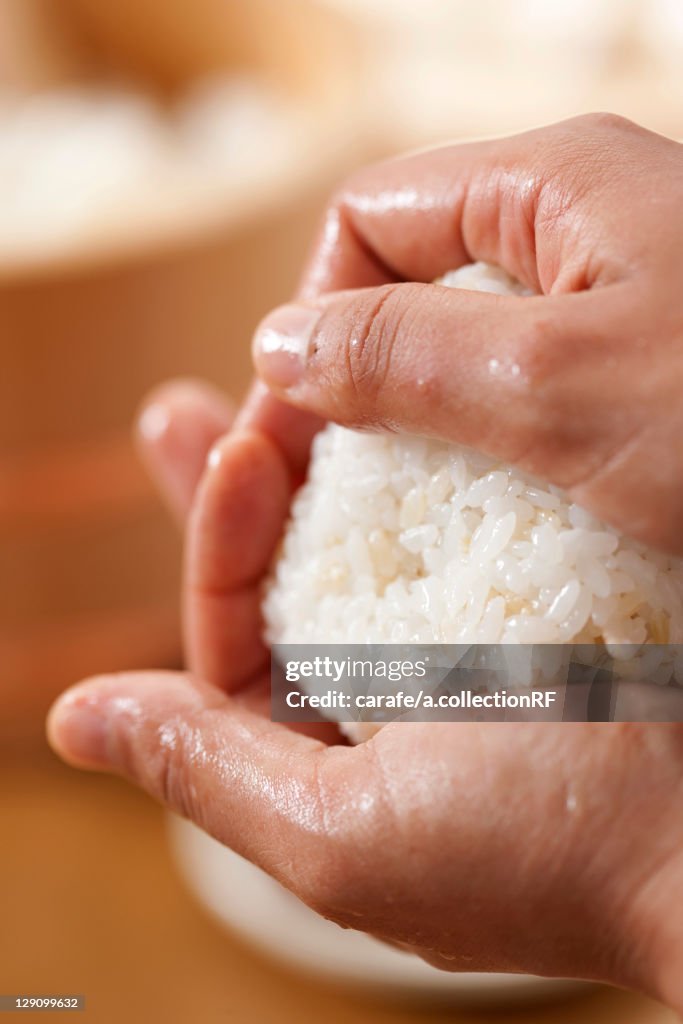 Hand Sprinkle Rice Hands Making A Rice Ball High-Res Stock Photo - Getty Images