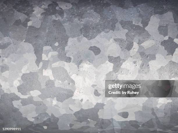 close-up shot of the surface of an urban street lamp - camo background stock pictures, royalty-free photos & images