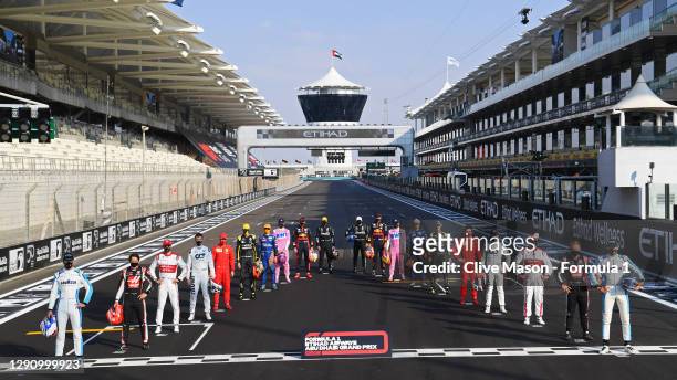 The F1 drivers pose for the Class of 2020 photo on the grid prior to the F1 Grand Prix of Abu Dhabi at Yas Marina Circuit on December 13, 2020 in Abu...