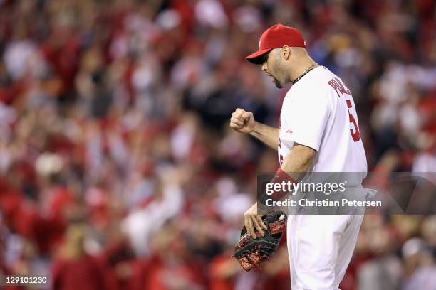 Albert Pujols of the St. Louis Cardinals reacts after the Cardinals won 4-3 against the Milwaukee Brewers during Game Three of the National League...