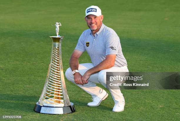 Lee Westwood of England is presented with the Race to Dubai trophy after the final round of the DP World Tour Championship at Jumeirah Golf Estates...