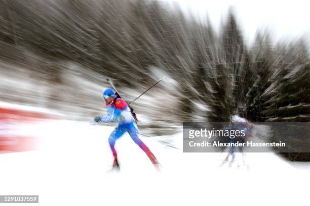 Evgeniy Garanichev of Russia leads the pack during the Men 4x7.5 km Relay Competition at the BMW IBU World Cup Biathlon Hochfilzen at at Biathlon...