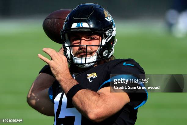 Gardner Minshew of the Jacksonville Jaguars warms up before the game against the Tennessee Titans at TIAA Bank Field on December 13, 2020 in...
