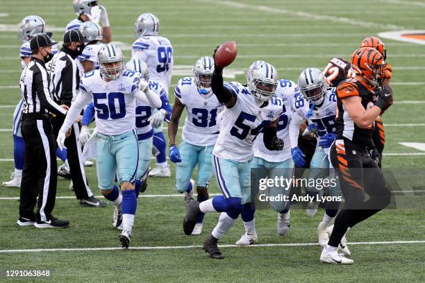 Jaylon Smith of the Dallas Cowboys celebrates after recovering a fumble in the first quarter against the Cincinnati Bengals at Paul Brown Stadium on...