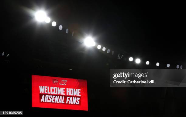 The big screen displays a message welcoming back Arsenal fans to the stadium prior to the Premier League match between Arsenal and Burnley at...