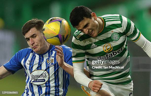 Aaron McGowan of Kilmarnock vies with Mohamed Elyounoussi of Celtic during the Ladbrokes Scottish Premiership match between Celtic and Kilmarnock at...