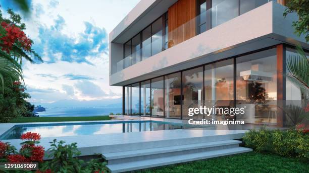 luxus villa äußere - blick durchs fenster aussenaufnahme haus stock-fotos und bilder