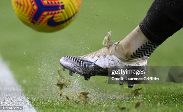 Detail shot as a boot kicks a ball during the Premier League match between Arsenal and Burnley at Emirates Stadium on December 13, 2020 in London,...