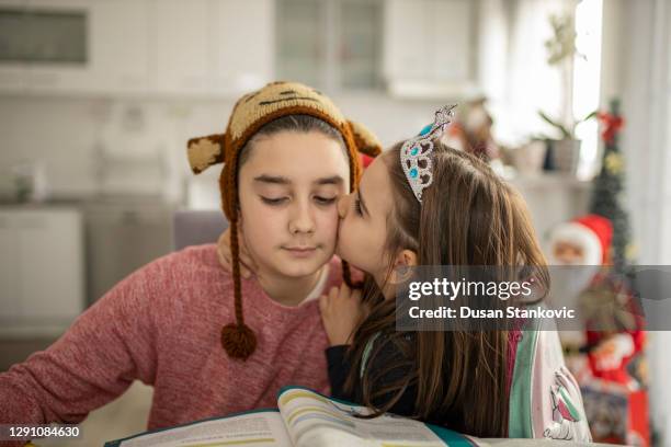 sibling brother and sister at home - boy tiara stock pictures, royalty-free photos & images