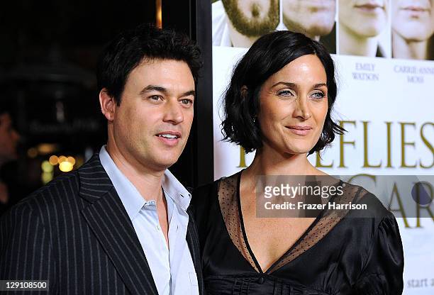 Actors Steven Roy and Carrie-Anne Moss arrive at the pemiere of "Fireflies In The Garden" at the Pacific Theaters at the Grove on October 12, 2011 in...