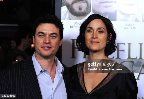 Actors Steven Roy and Carrie-Anne Moss arrive at the pemiere of "Fireflies In The Garden" at the Pacific Theaters at the Grove on October 12, 2011 in...