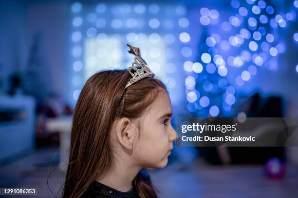 portrait of cute girl with tiara - tiara profile stock pictures, royalty-free photos & images