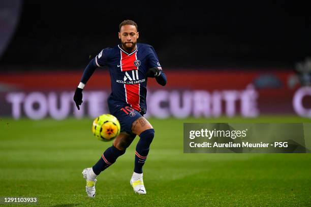 Neymar Jr of Paris Saint-Germain runs with the ball during the Ligue 1 match between Paris Saint-Germain and Olympique Lyon at Parc des Princes on...