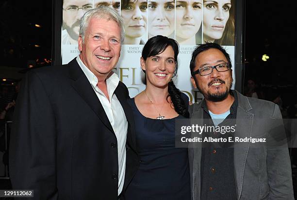 Producers Philip Rose, Vanessa Coifman and Writer/Director Dennis Lee arrive at the "Fireflies In The Garden" Premiere at Pacific Theaters at the...