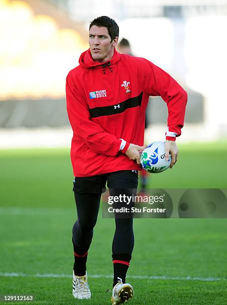 Flyhalf James Hook runs with the ball during a Wales IRB Rugby World Cup 2011 training session at Mt Smart Stadium on October 13, 2011 in Auckland,...