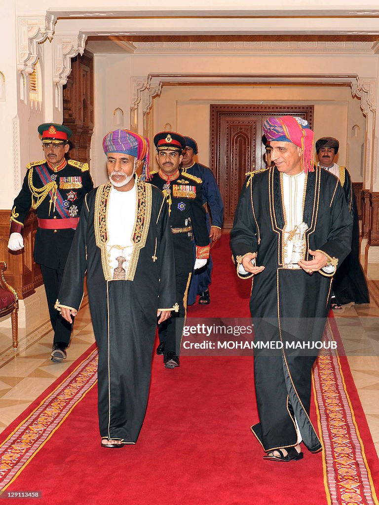 Omani ruler Sultan Qaboos bin Said walks with Deputy Prime Minister ...