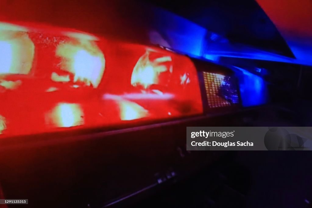 Emergency lights on a police car flashing
