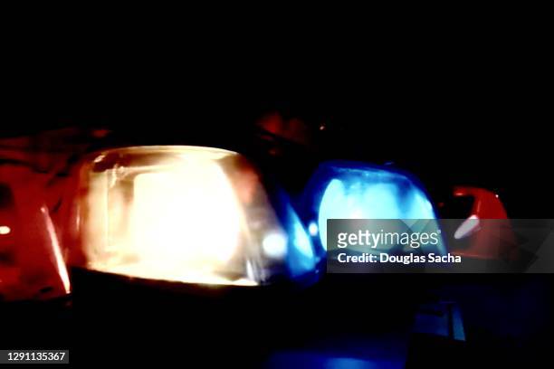 police patrol lights on car roof - ambulance lights stock pictures, royalty-free photos & images