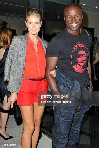 Heidi Klum and Seal arrive at the private viewing for Rankin and Damien Hirst's new gallery show on October 12, 2011 in Los Angeles, California.