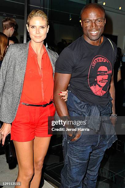 Heidi Klum and Seal arrive at the private viewing for Rankin and Damien Hirst's new gallery show on October 12, 2011 in Los Angeles, California.