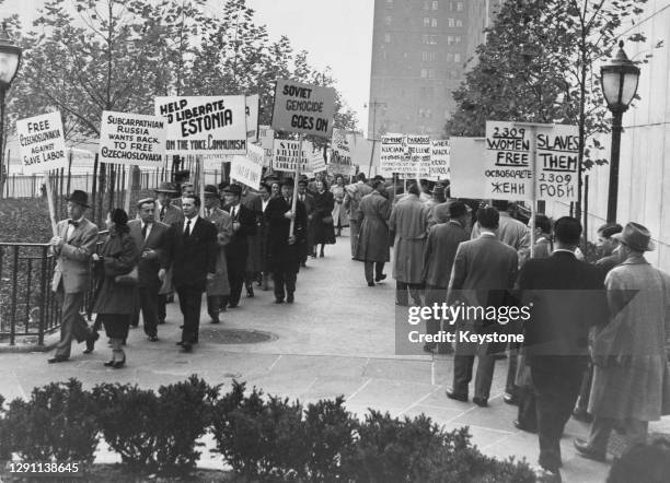 Former inhabitants of the Soviet Union's satellite countries form a picket in protest at the slavery conditions to which they say the USSR is...