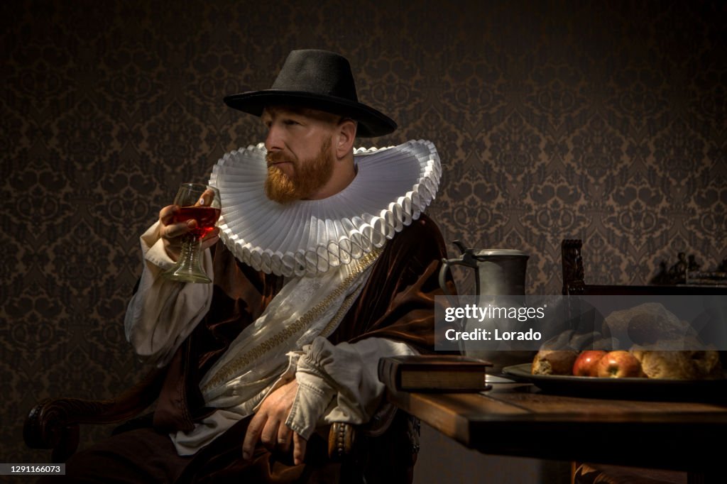 Redhead traditional dutch man by candlelight