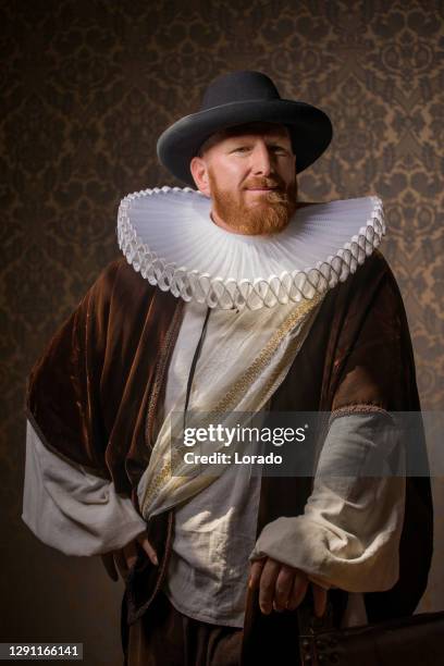 redhead traditional dutch man by candlelight - 17th century portrait stock pictures, royalty-free photos & images