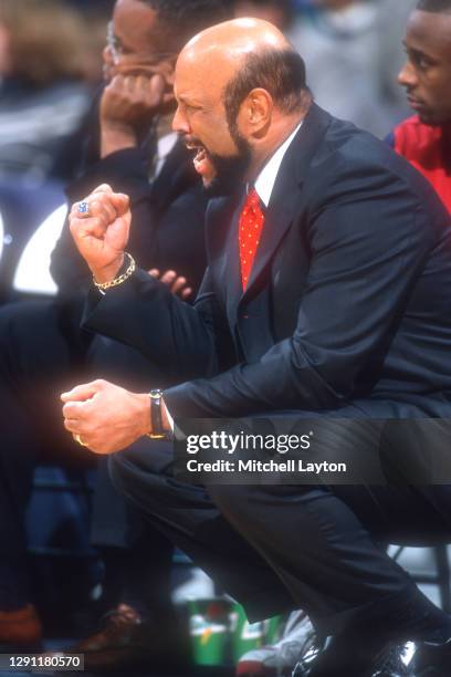 Head coach Mike Jarvis of the St. John's Redman celebrates a shot during a college basketball game against the Georgetown Hoyas at the MCI Center on...