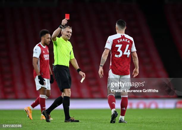 Granit Xhaka of Arsenal is shown a Red Card by Referee, Graham Scott during the Premier League match between Arsenal and Burnley at Emirates Stadium...