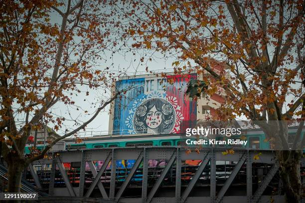The defaced mural of the Marianne, the national personification of the French Republic since the French Revolution, now shows tears of blood which...