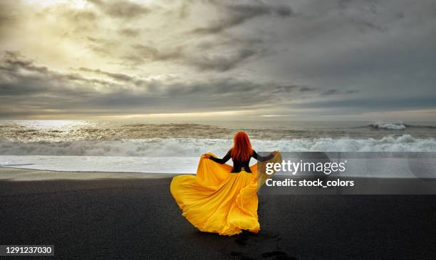 i have so much freedom here - yellow dress stock pictures, royalty-free photos & images