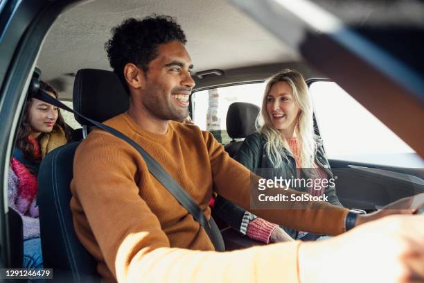 family drive - friends inside car stock-fotos und bilder