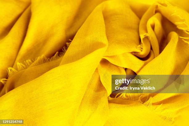 trendy yellow color of scarf or fabric background. - viscose stock pictures, royalty-free photos & images