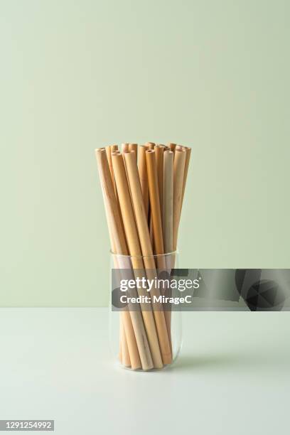 eco-friendly drinking straws made of bamboo - straw stock pictures, royalty-free photos & images